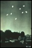 Eight unknown bullet shaped illuminating UFOs over New Dehli, India, 19 May 1964.