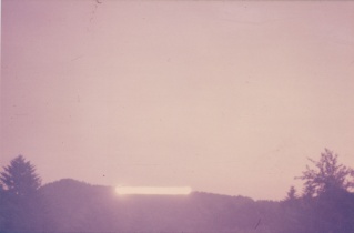 #725.[196] High Resolution. 22.06.79 at 5:25 AM. One of the energy ships, fading in the daylight, in the north-west direction.[197]