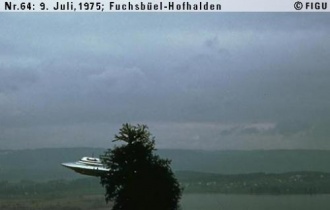 #64.[65] Semjase flying with her beamship around a wettertanne (weather pine) 14m height (the tree later eliminated by Semjase). Pfaffikersee in background. 9th July 1975.