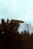 Semjase's aircraft flying away after Eduards first official conversation in the Frecht Nature Preserve, outside Hinwil, Switzerland. Photographed after Contact Report 001 on 28th January 1975.