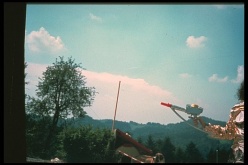 The full photograph showing Alena with Menara's ancient laser device during Contact Report 078) on 6th July 1977.